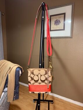 Coach Tan Signature Canvas Crossbody with Coral Strap